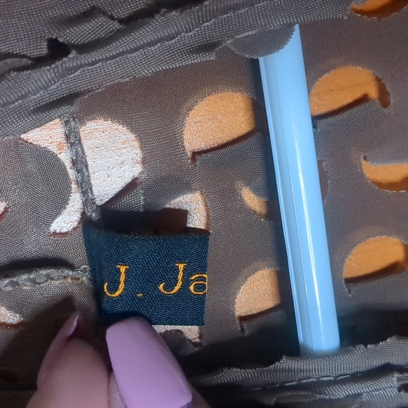 J. JANET* fun funky asymmetrical 'hole-y' vest in a neutral taupe colour - Picture 7 of 10